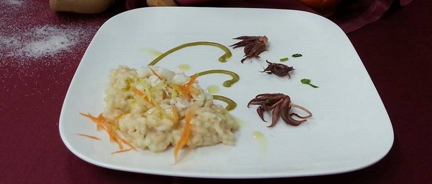 Risotto ai crostacei lime e burrata su crema di asparagi