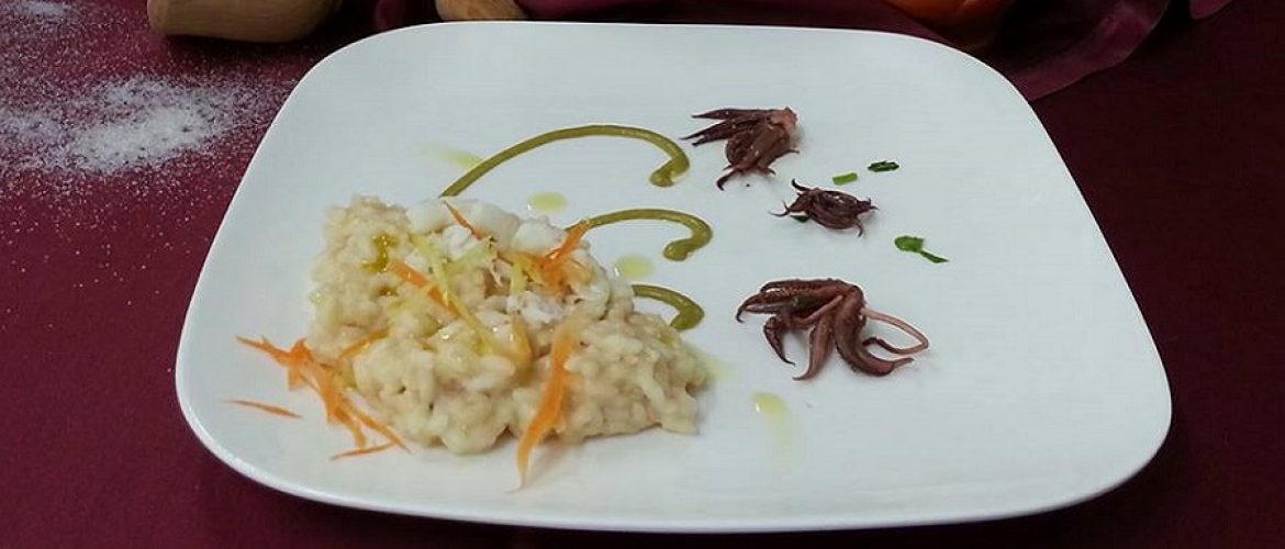 Risotto ai crostacei lime e burrata su crema di asparagi