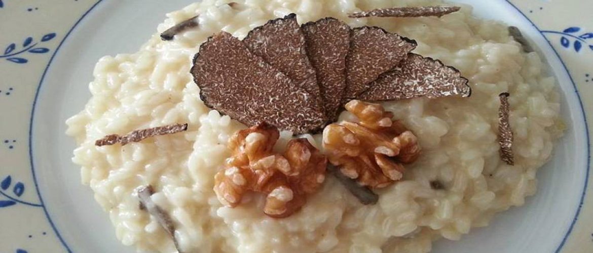 Risotto con fonduta noci e tartufo